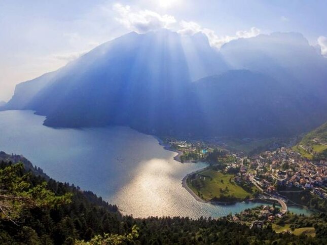 Lake Molveno, a natural oasis away from the city, surrounded by the Dolomites