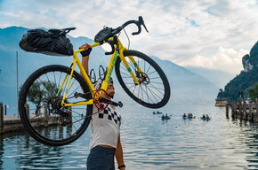Cyclist in Riva del Garda, final stage of the DoGa | © Madonna di Campiglio Azienda per il Turismo 
