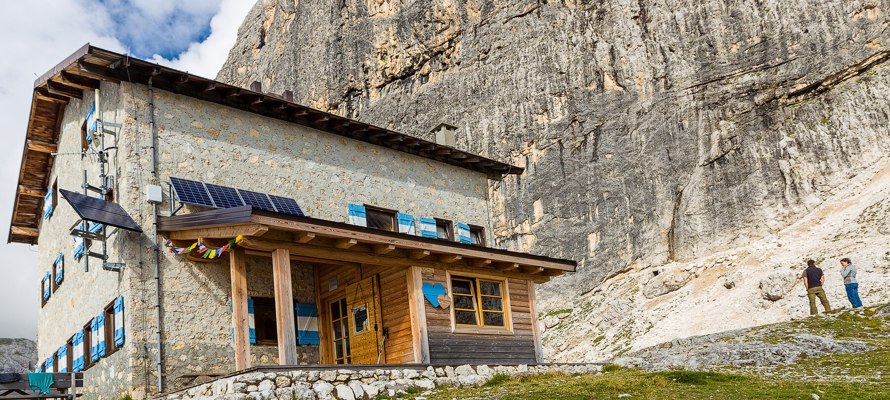 Elisa, Piero and a mountain hut in the Pale di San Martino.