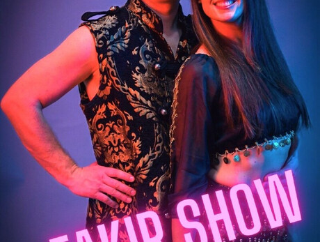 The image shows the artists Moris and Jenny.