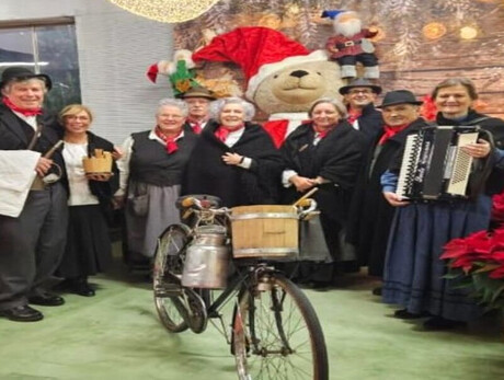 group of musicians in traditional Trentino dress