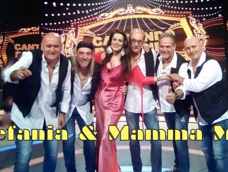 The image shows Stefania and the Mammamia orchestra.